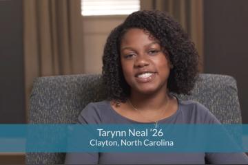 A woman smiles with text overlay reading "Tarynn Neal '26 Clayton, North Carolina."