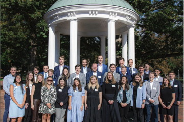 Members of YALC stand together in front of the Old Well