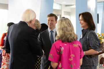 Chancellor Lee Roberts and wife Liza Roberts speak to Carolina donors at an event