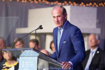 John Townsend speaking at a podium during the launch event of the Campaign for Carolina.