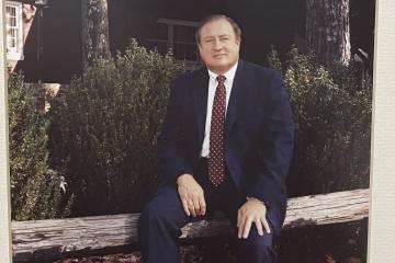 Thad Eure Jr. in front of the Angus Barn.