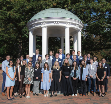 Members of YALC stand together in front of the Old Well