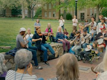 Giddens and Justin Robinson host a &ldquo;Joe Jam&rdquo; session in front of Wilson Library. 