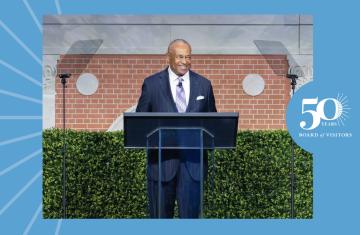 Michael Kennedy speaking at a podium