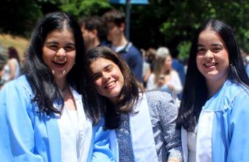 The three Martinez sisters pose at the twins' graduation