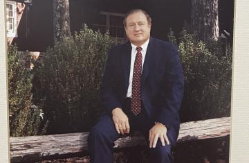 Thad Eure Jr. in front of the Angus Barn.