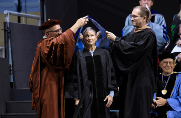 A doctoral candidate getting hooded.