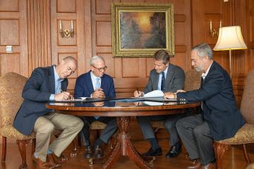 Jason P. Mihalik, PhD, co-director, Matthew A. Gfeller Sport-Related Traumatic Brain Injury Research Center; David Routh, vice chancellor for University Development; Kevin Guskiewicz, PhD, chancellor; Dr. James Kelly, executive director, Marcus Institute for Brain Health
