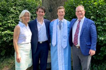 A photo of the Batchelder family showing the Batchelders' two sons