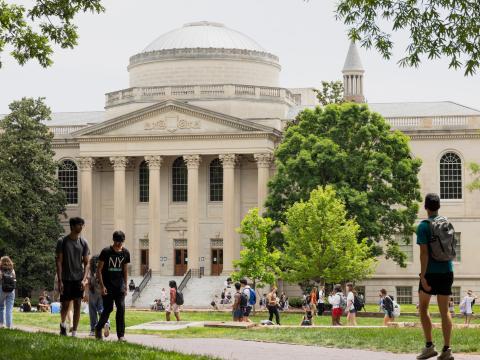 Students walking in front of Wilson Library