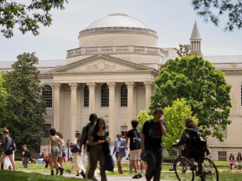 Students walking in front of Wilson Library