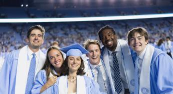Graduates gather for a picture during the spring 2025 commencement ceremony