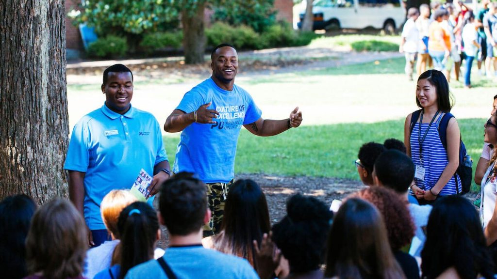 Camp counselors from Project Uplift speak to program attendees on Carolina's campus