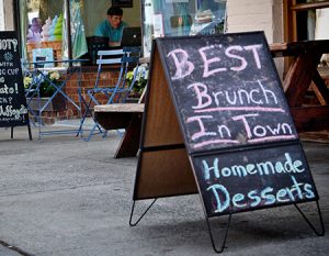Sign outside a restaurant that says Best Brunch in Town.